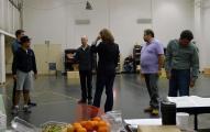 Tosca BTS - John Caird giving direction to cast during stagin rehearsal